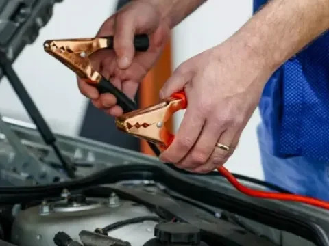 Strathmore battery boost service for a vehicle with a dead battery