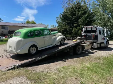 Langdon towing company helping a driver with vehicle transport.