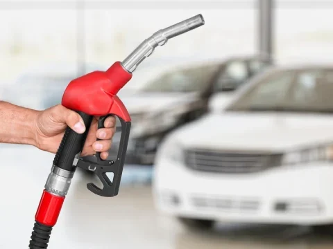 Fuel delivery service helping a driver stranded on the roadside near Calgary