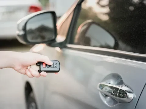 Technician unlocking a vehicle in Northeast Calgary
