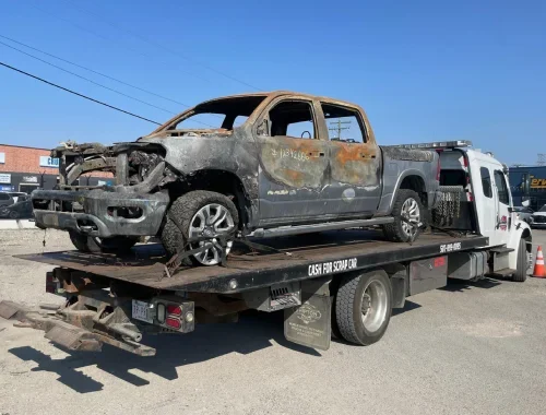 Roadside battery boost service helping a vehicle with a dead battery start again.