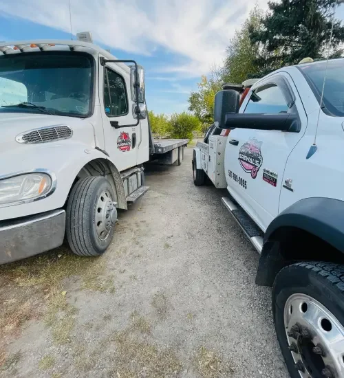 Rollback tow truck prepared for local vehicle towing in Strathmore