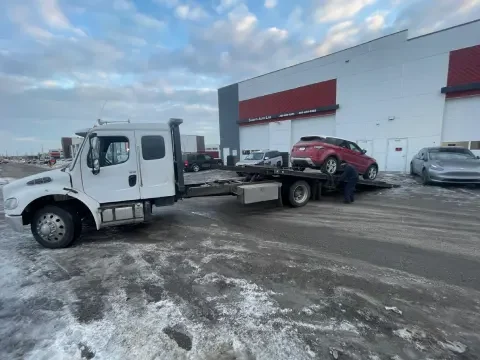 Tow truck ready for vehicle towing service in Chestermere.