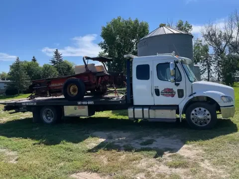 Flatbed towing service near Glenmore Trail in Langdon