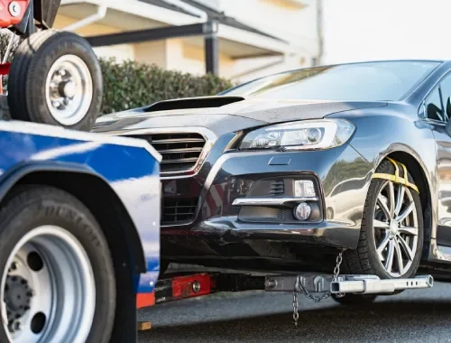 Towing services for cars, pickups, vans, flatbed towing, and wrecker towing with dollies.